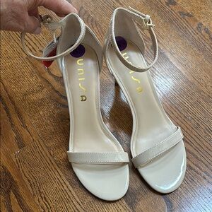 Unisa Cream Heels with Strappy Design and Medium Height